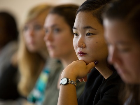Students in a row in a classroom