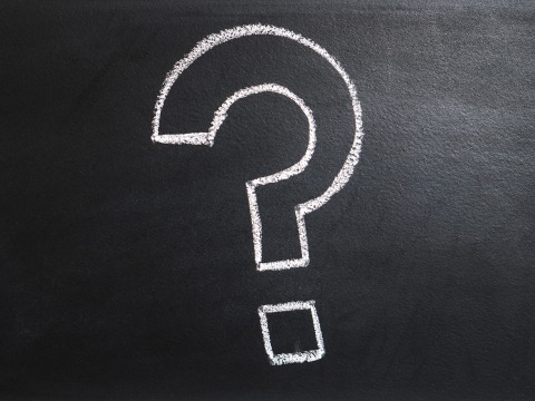 Blackboard with question mark drawn on it