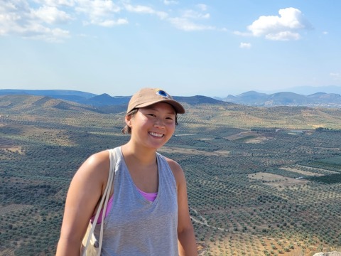 Kendall Yim ’24 with fields in the background