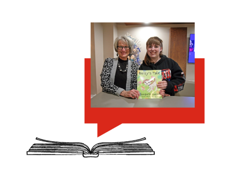 Liz Hansen and Maekella Mitchell holding their book