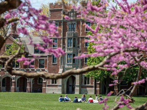 Grinnell's Gates Rawson Tower with pink spring blooms