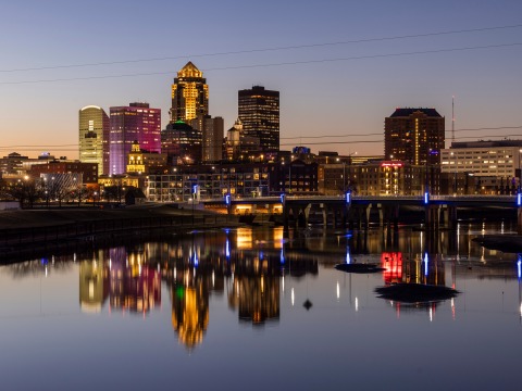 The Des Moines skyline illuminated at sunset.