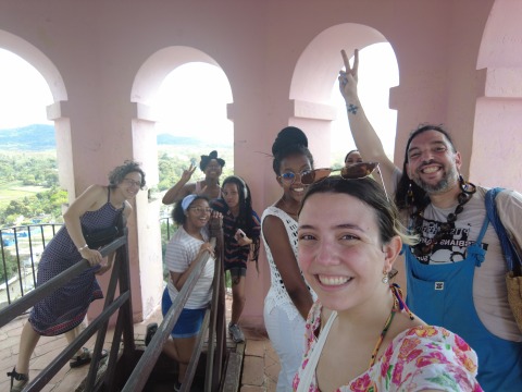 Global Learning Program student group wave at the camera in Havana.