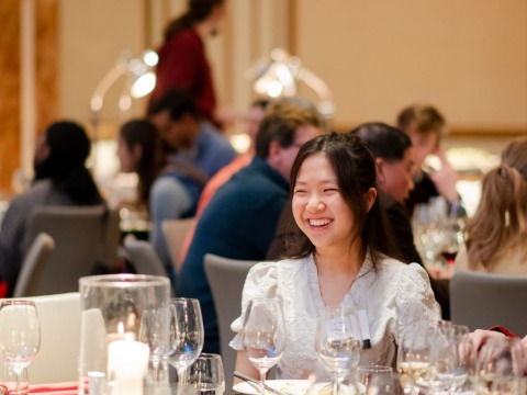 Phuong Tran at a fancy dinner.