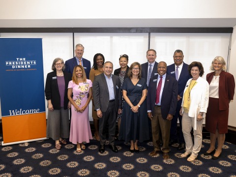 Grinnell College President Anne F. Harris appears in a group photo of university presidents attending an annual dinner hosted by Bucknell University.