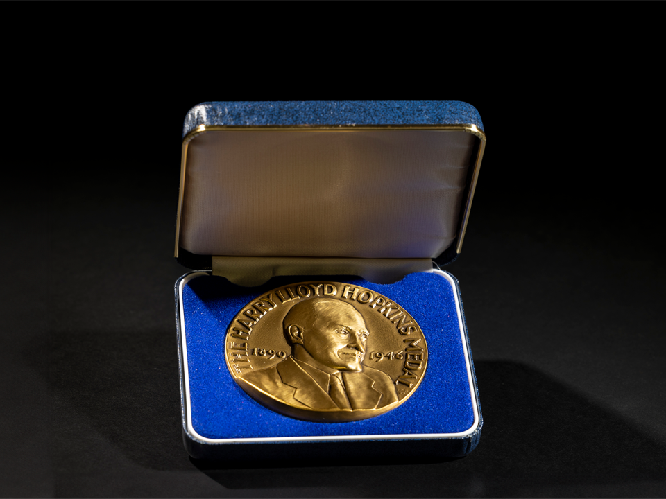 Harry Hopkins Medal in a velvet lined case.