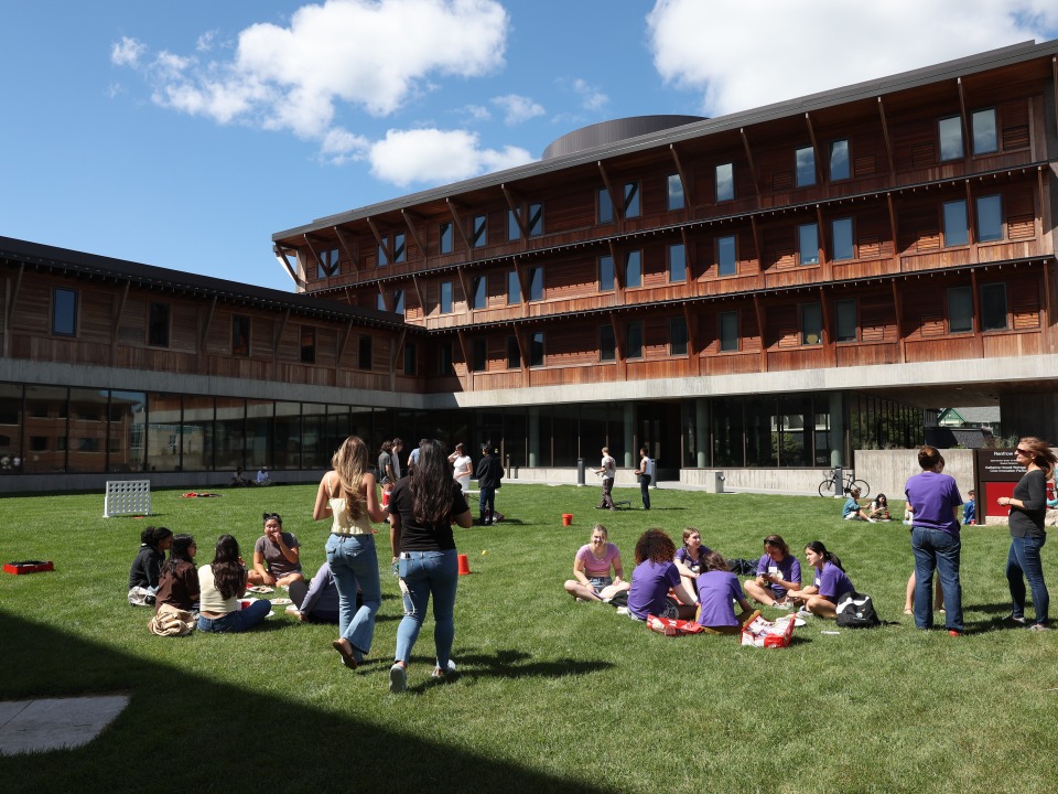 MtC Banner: Students on the Renfrow Hall grounds