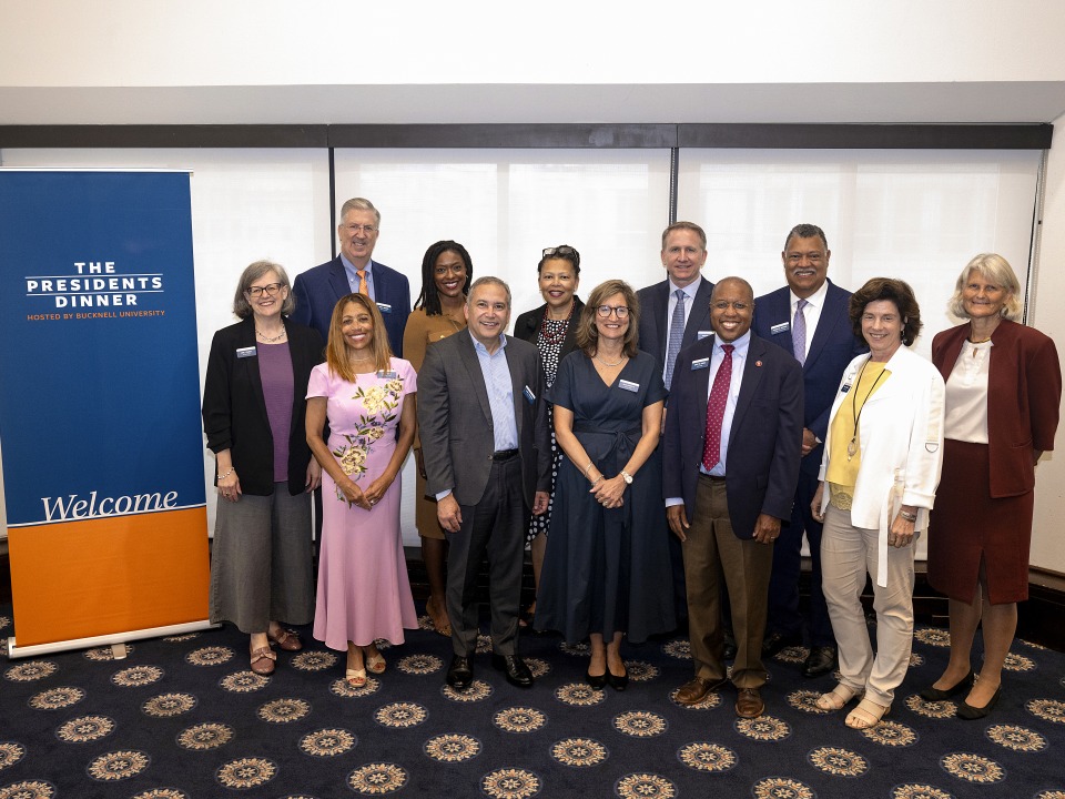 Grinnell College President Anne F. Harris appears in a group photo of university presidents attending an annual dinner hosted by Bucknell University.