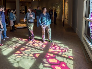 A colorful pattern of sunlight shines into the Museum of Art.