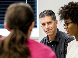 Ross Haenfler in discussion with a group of students