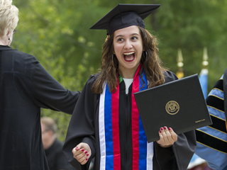 Student celebrates after receiving degree