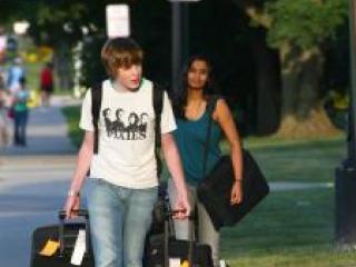 Students carry their bags