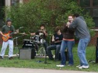 A student band performs outside