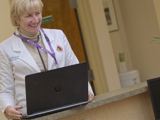 doctor with laptop computer