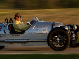 Professor Freeman driving in the ‘Spirit of Grinnell’