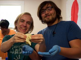 Peter Marsh ’19 (left) and Jacob Shima ’21 proudly display their finished mooncake.