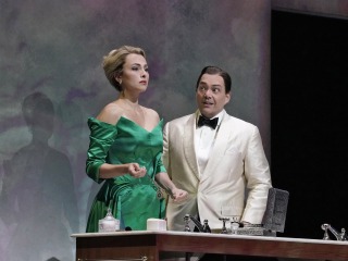 Scene with man and woman in formal dress from the Met Opera, Marnie