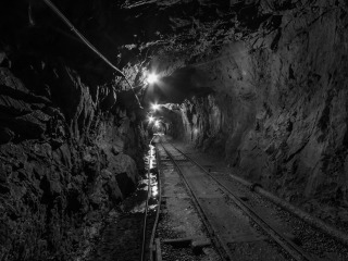 Mining tunnel with tracks