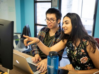 Ben Nguyen ’19 and Ridhika Agrawal ’20 working together at a computer
