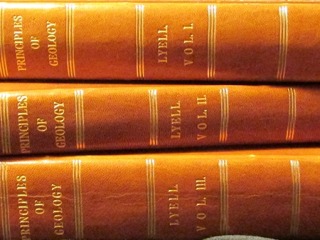 Three volumes of Principles of Geology 