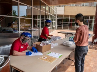 Student picks up a meal at the JRC after the 2020 derecho
