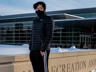 Vidush Goswami outside the Bear Athletic and Recreation Center in winter