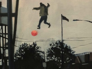 Man in air with ball