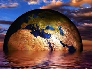 Earth globe in water