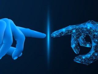 human hand reaches toward digital hand