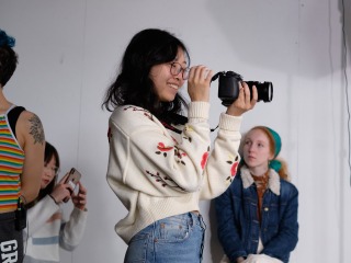 Nana Okamoto ’20 looks through the camera during Fundamentals of Video Production class