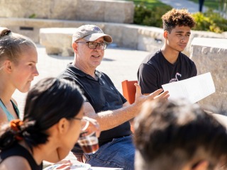 Professor Todd Armstrong and class outdoors