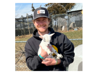 Tommy Hexter '21 with goat