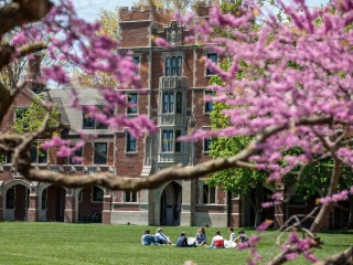 Grinnell's Gates Rawson Tower with pink spring blooms