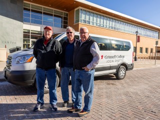 Grinnell College Local Shuttle drivers (pictured left to right) Larry Kramer, Jim White, and Billy Gilbreaith foster connections and enrich experiences for students through their conversations and shared journeys. 