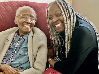 Irma McClaurin poses with a smiling Edith Renfrow Smith