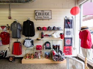 bookstore display with clothing, good branded as Grinnell College