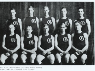 Black and white photo of a men's basketball team, with Harry Hopkins in the back row