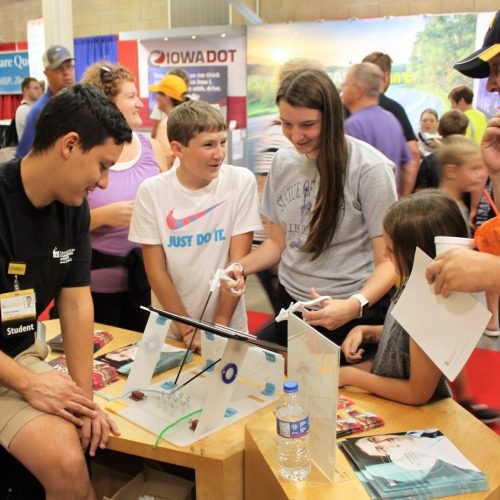 Collin Kramer works with younger students