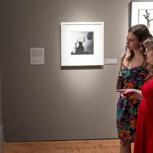 students looking at art in gallery