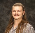 Headshot of Jadyn V. Breland, Assistant Professor of Mathematics at Grinnell College.