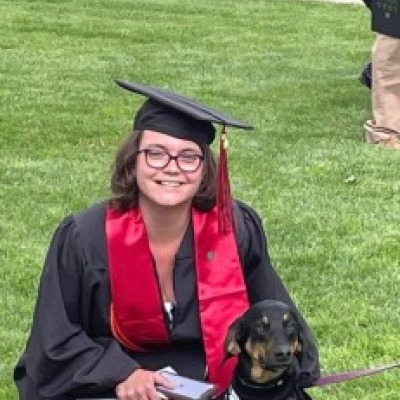Sarah Beisner in Grinnell cap and gown
