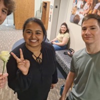 Adyasha Anindita (center) with fellow members of the Grinnell Singers.
