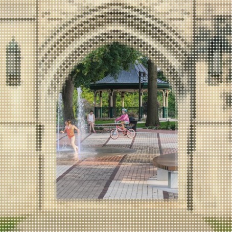 Image of children playing within a pixelated stone archway