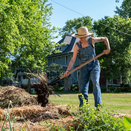 Student working in the college garden