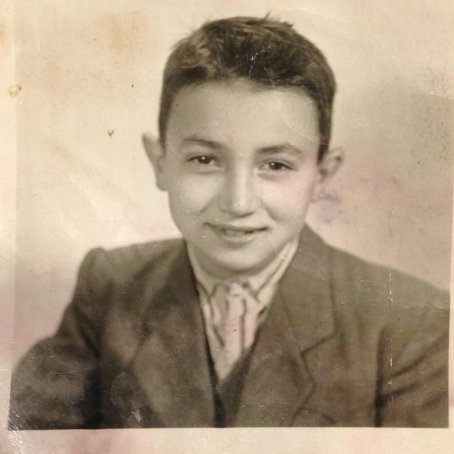 An old black and white photo of HArold Kasimow as a child