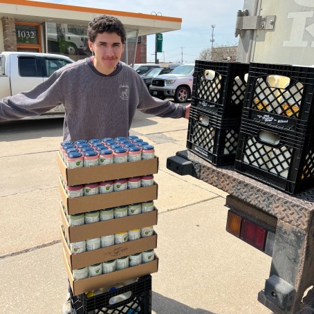 Tristan Davis ’25  with cart outside 
