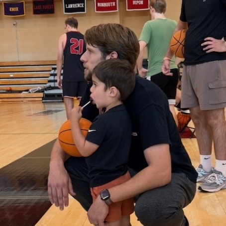 Smith and his son Charlie on the sidelines 