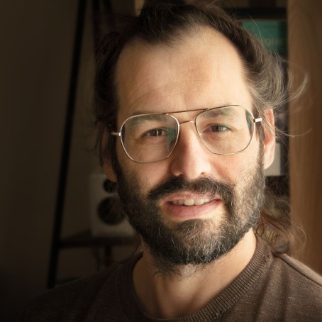 Headshot of Dan Sinykin