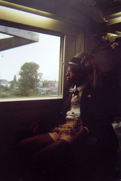 Jean Ulrick Desert in lederhosen costume on train