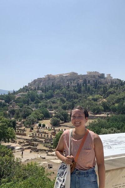 Kendall Yim ’24 with Greek ruins in Athens